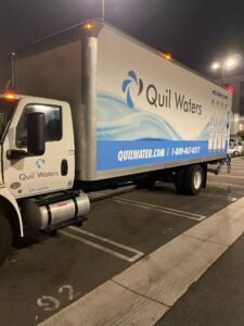 Quil Water truckload water to the homeless in LA county water project.